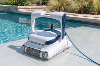 Dolphin Sigma Robotic Pool Cleaner with Gyroscope, Wi-Fi, Oversized Filters, & 3 Year Warranty robotic pool cleaner beside a pool